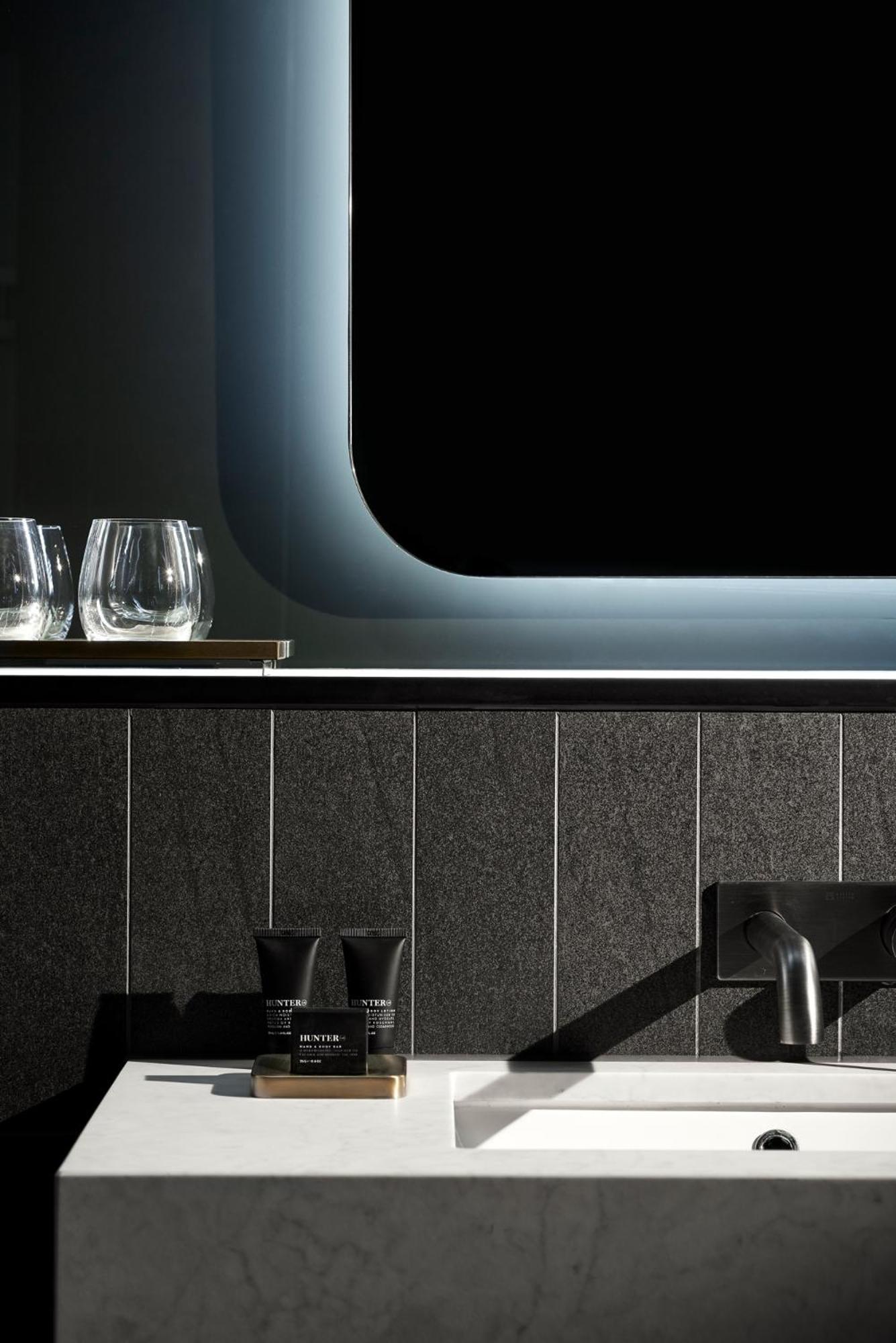 Midnight Hotel, Autograph Collection Canberra Eksteriør bilde A kitchen with a black granite countertop